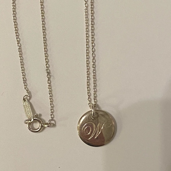 Tiffany & Co. Jewelry - “W” Tiffany & Co. disc necklace